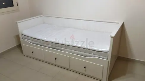 Ikea White wooden daybed with trundle storage, single size