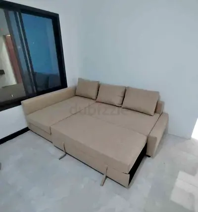 Ikea L Shape Sofa cum bed with big storage in L