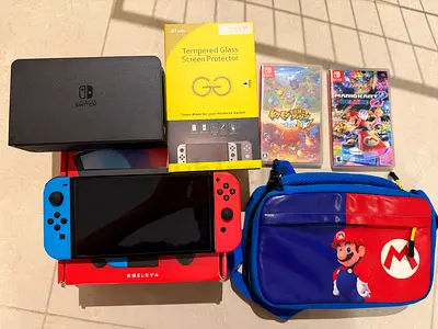 Nintendo Switch OLED (Neon Red/Blue) Full Bundle with 2 Games  Mario Case