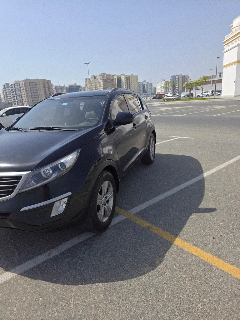 Kia Sportage 2013 — photo 1 of 15