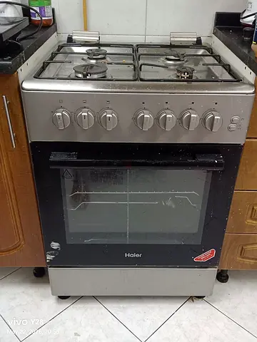 Haier 4-Burner Gas Cooker with Oven - Used, Good Working Condition  But oven need a service