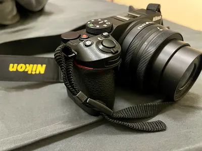 Nikon z30 mirrorless camera with attached lens and strap - good condition