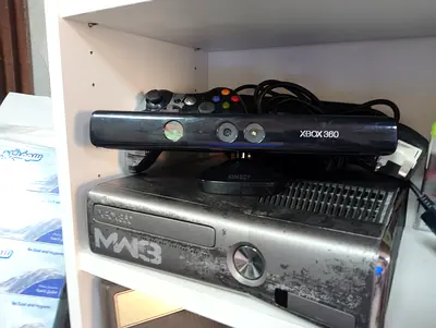 Xbox 360 with Kinect + 120 games