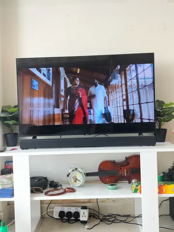 44-inch Samsung LED TV with JBL Soundbar - Good Working Condition with tv stand