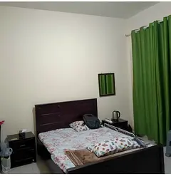Fully furnished master bedroom in a sharing one bhk flat in emirates city for rent