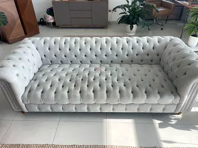 Light grey tufted 3-seater Chesterfield sofa - good condition