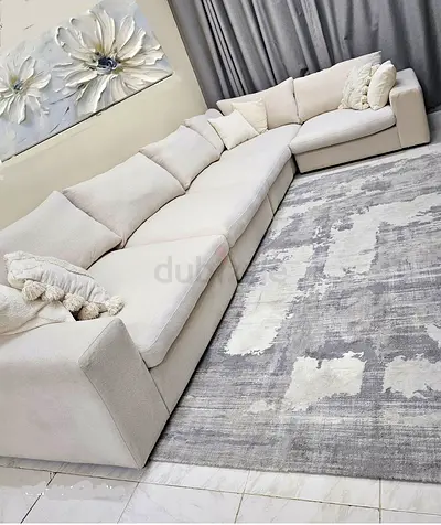 European DH Sectional Modular Filled Feather sofa like new.