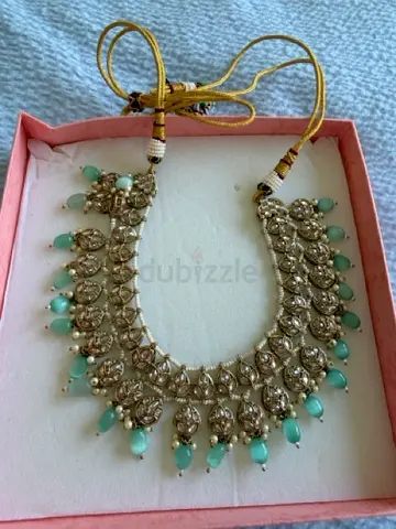 Traditional Indian kundan necklace with mint bead drops