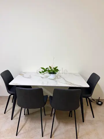 White Marble-Effect Dining Table with 4 Dark Grey Chairs - Good Condition