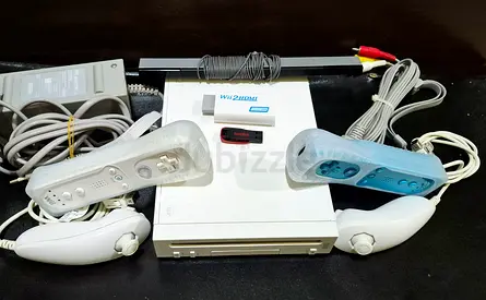 Nintendo Wii with all cables, 2 controllers and more than 50 games