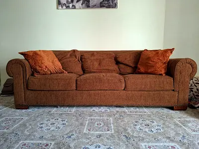 Brown 3-Seater Fabric Sofa with Cushions - Good Condition. Home center.