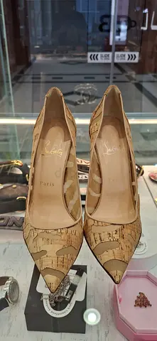 Christian Louboutin Cork Pointed Toe Pumps