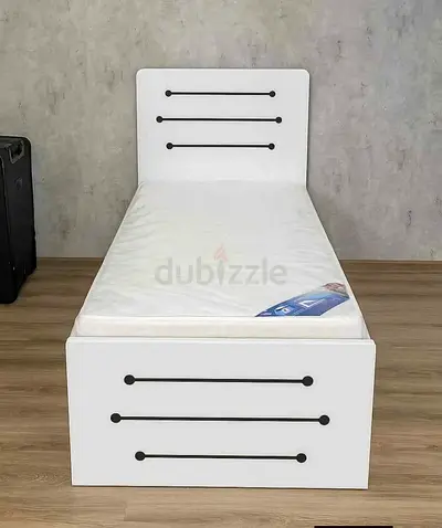 Single white wooden bed frame with mattress - simple modern design