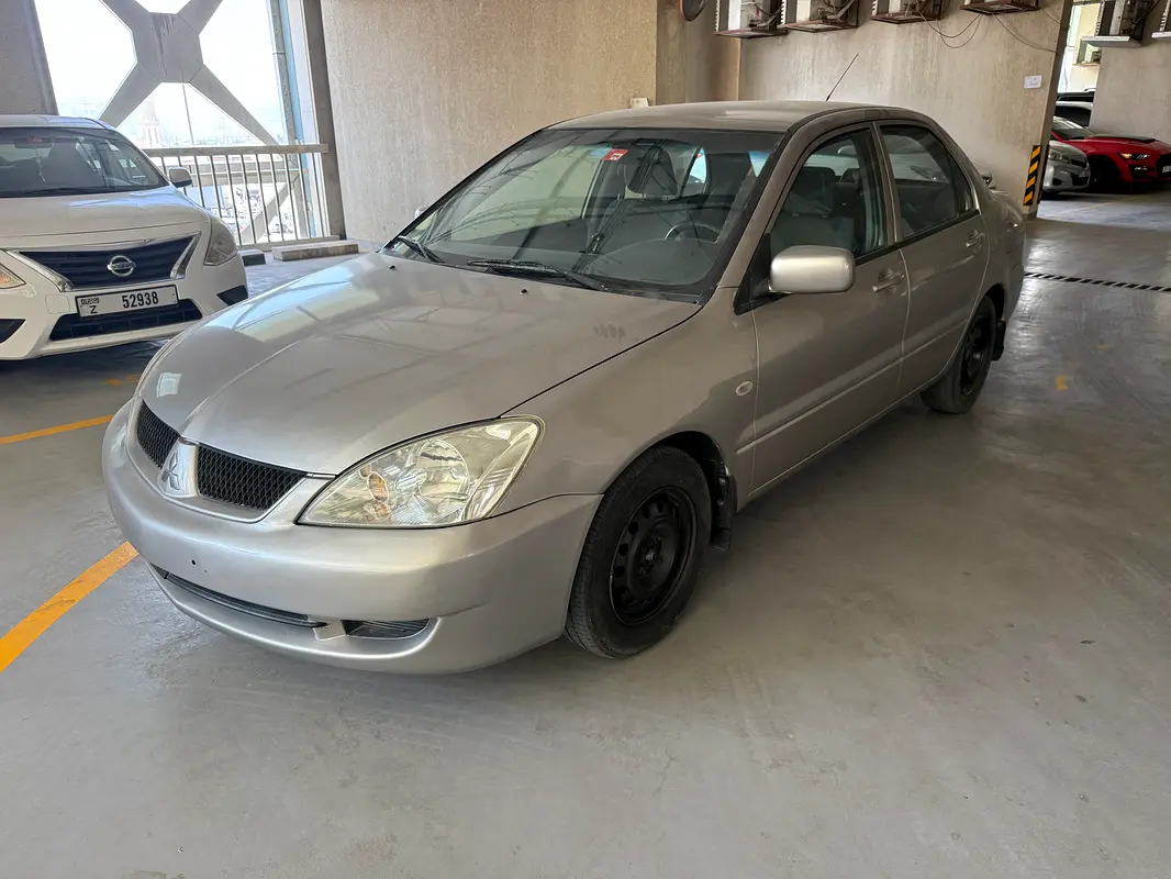 Mitsubishi Lancer 2009 — photo 1 of 9