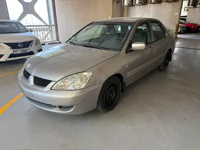 Mitsubishi Lancer GLS 2009 GCC Specs 1.3. 4 cylinder.RTA passed. Ready for registration.