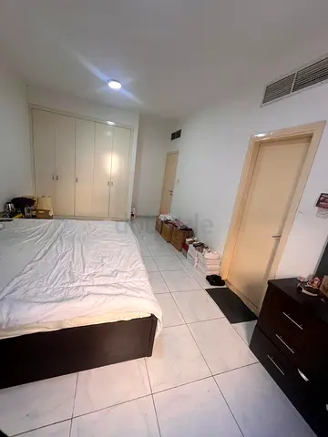 Master bedroom with attached bathroom behind sppineys supermarket