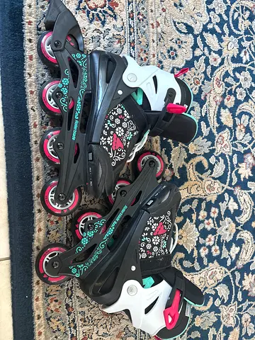 Adjustable Kids Inline Roller Skates - Size Adjustable EU 36.5 to 40.5, Good Condition. With pads.