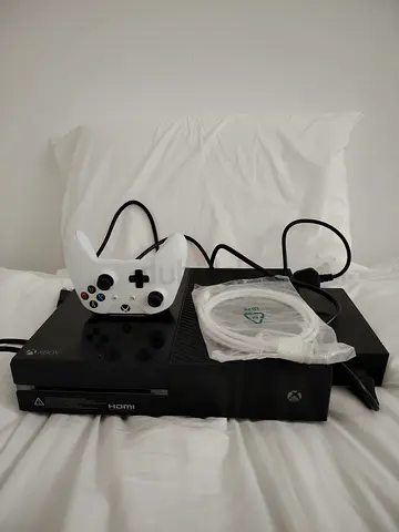 Xbox One console with controller, games and cables Delivery Available