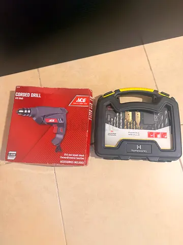 Corded electric drill with drill bit set - lightly used