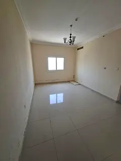 Annual apartment for rent in Sharjah one bedroom hall central AC master room wall cabinets and 2 bat