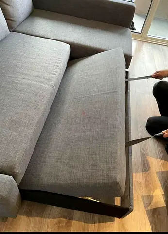 Grey  pull-out sofa bed — good condition