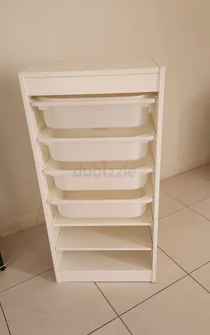IKEA-style white storage unit with 4 plastic drawers and shelves