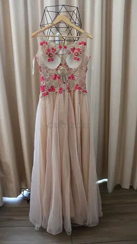 Long blush evening gown with floral embellished bodice