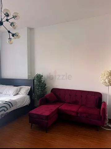 Maroon Velvet L-Shape Sofa Bed with Ottoman