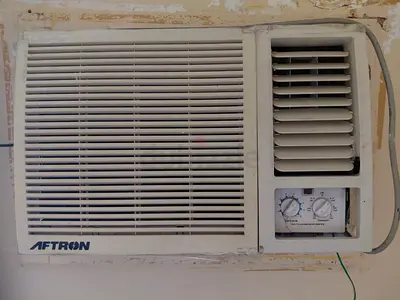 Window Air Conditioner AFTRON - Used, it  needs repair