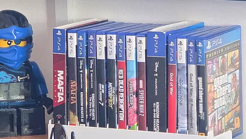 Collection of PS4 / PS5 games for sale.