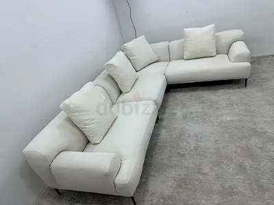 Cream color the loom collection lshape sofa