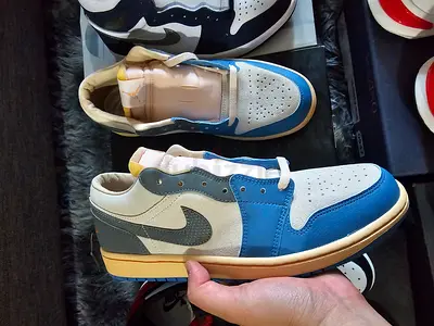 Air Jordan 1 Low Blue and Grey Sneakers