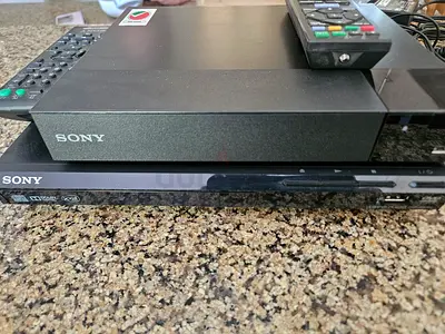 Sony DVD player with remotes - used, working
