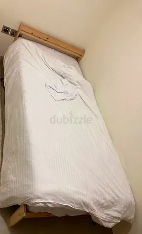 Single wooden ikea Neiden bed frame with VESTMARKA mattress (good condition).