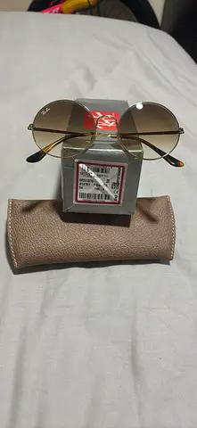 Ray-Ban Round ORB 1970.                 Gold Frame Sunglasses with Case brand new original never use