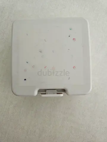 Small white plastic storage box — used, good condition