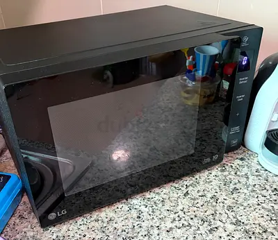 LG countertop microwave - works well, gently used