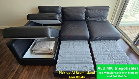 IKEA black modular leather finish sofa with storage  pull-out bed - heavily used FREE cover(AED849)