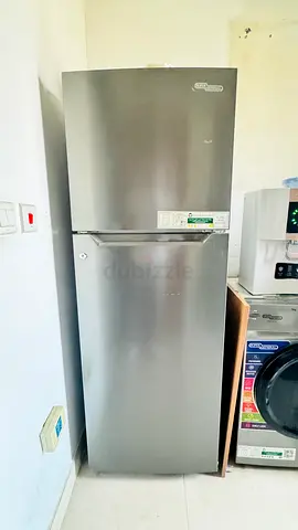 Silver double-door refrigerator - good working condition