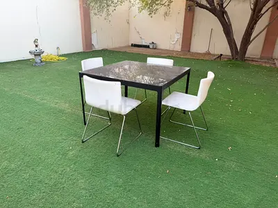 Outdoor square dining table with 4 white chairs - used (still perfect condition)