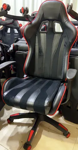 Used Black and Red Gaming/Office Chair with Adjustable Armrests