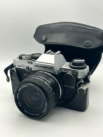 Olympus OM-10 28mm lens 35mm film camera