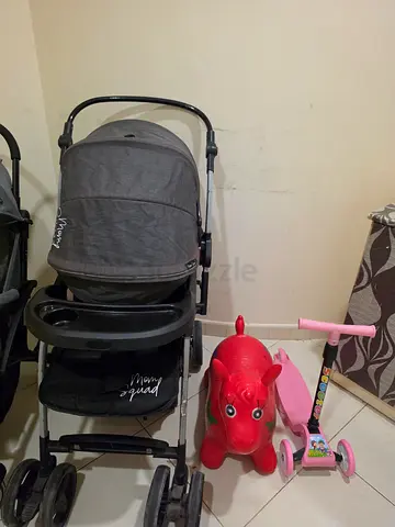 Mom squad baby stroller- almost new standard size - big wheels - free 2 toys scoter and cow