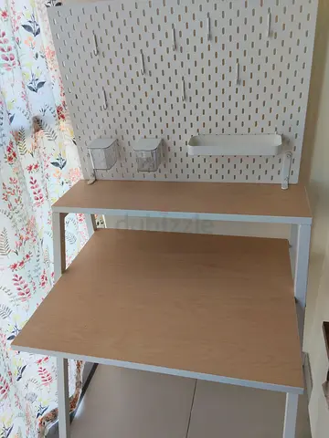 Working desk with peg board and accessories