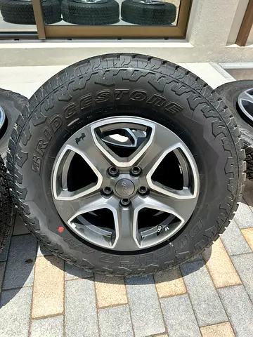 2021 Jeep Wrangler OEM 17” Wheels  Bridgestone Dueler A/T Tyres 245/75R17 – Set of 5