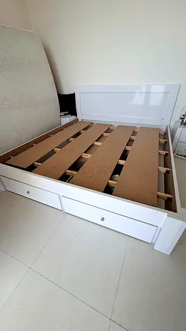 White wooden double bed frame with storage drawers - good condition