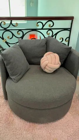 Swivel accent chair chaise lounge in grey color with a modern round design.  In excellent conditions