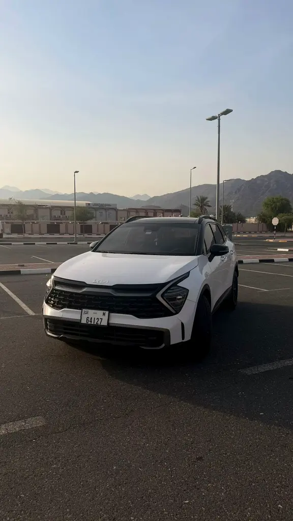 Kia Sportage 2024 — photo 1 of 11