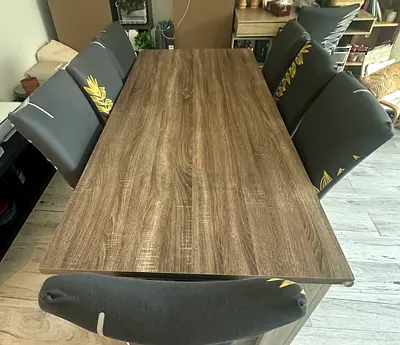 Wood-Effect Dining Table with 8 Cushioned Chairs - Good Condition