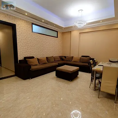Furnished 3-bedroom apartment with living room for monthly rent in Ajman, Al Rawsa 3 area, Sheikh Khalifa Street extension, behind Bakhr Al Emarat Res